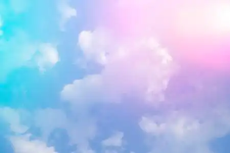 粉色天空色彩斑斓的天空和云彩,粉色和蓝色的颜色背景照片