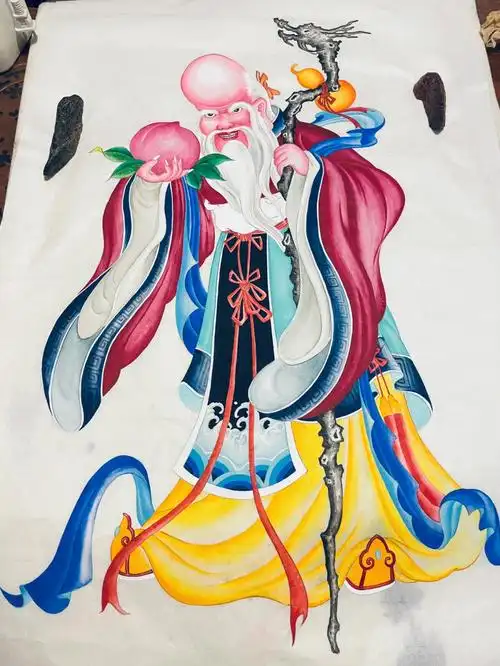 寿画老人过寿准备送一副寿画
