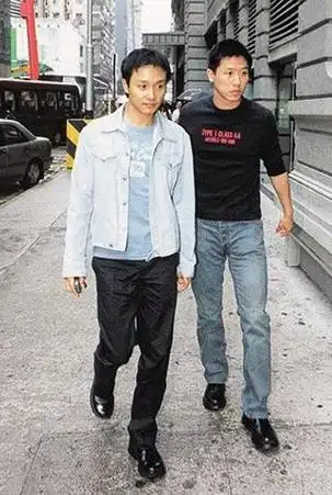 张国荣与唐鹤德(资料图)