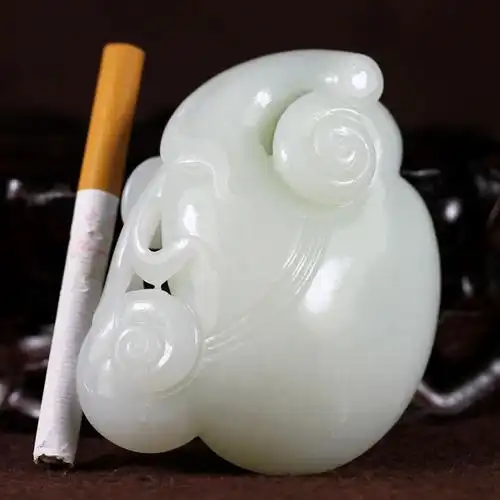 玉雕名家钟山作品和田玉白玉如意手把件 195克