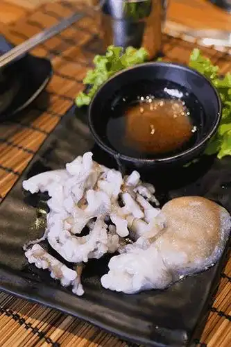 如何生吃活章鱼?享受一下喉咙里滑动的美食!