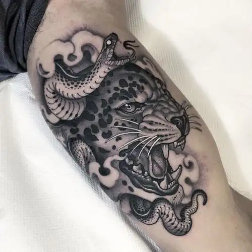 大臂黑灰oldschool豹子蛇纹身图案