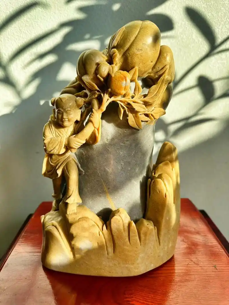 长白石精工手工大师雕刻《仙童贺寿桃》藏品