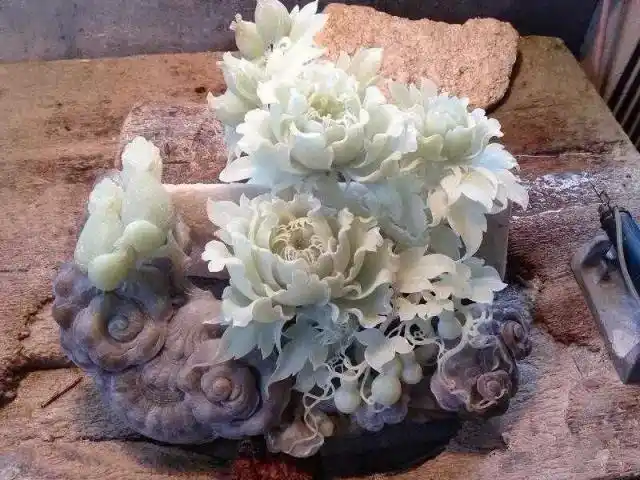 海量玉雕牡丹花欣赏牡丹,是玉雕的常用题材,经过雕刻师傅精心巧雕出来
