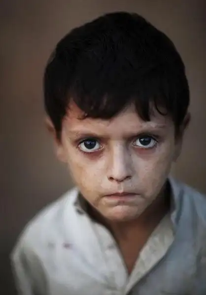 战地摄影师作品"难民营孩子的目光"--中国摄影家协会网