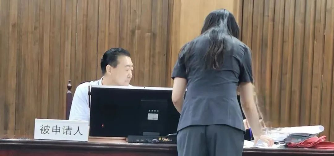 张新明在6月19日庭审现场