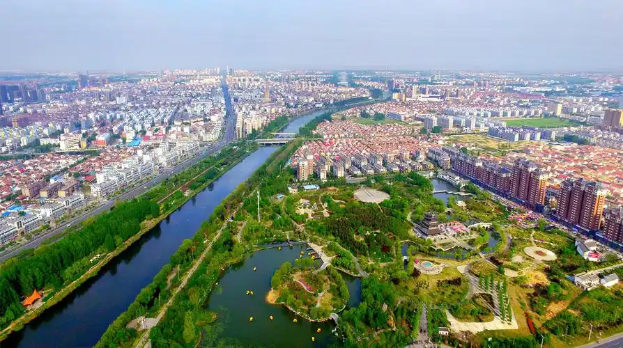 连云港赣榆精心描绘黄海之滨绿色生态画卷把城市建在公园中让森林走进